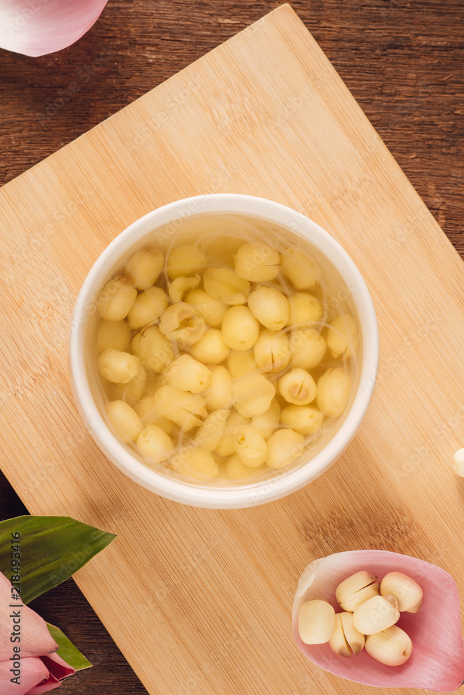 Vietnamese food, sweet lotus seed gruel, ingredients: lotus bean, sugar candy. this Vietnam dish for dessert or snack, very delicious, tasty, nutrition, make sleep well Vietnamese food, sweet lotus seed gruel, ingredients: lotus bean, sugar candy. this Vietnam dish for dessert or snack, very delicious, tasty, nutrition, make sleep well
