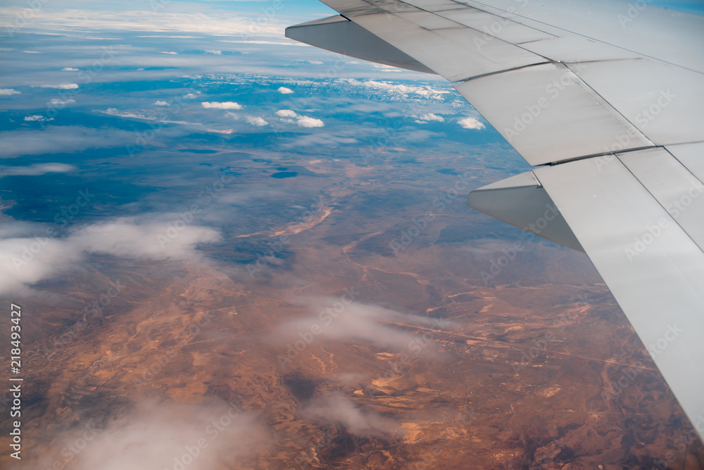 Obraz premium View on desert in Arizona from plane window