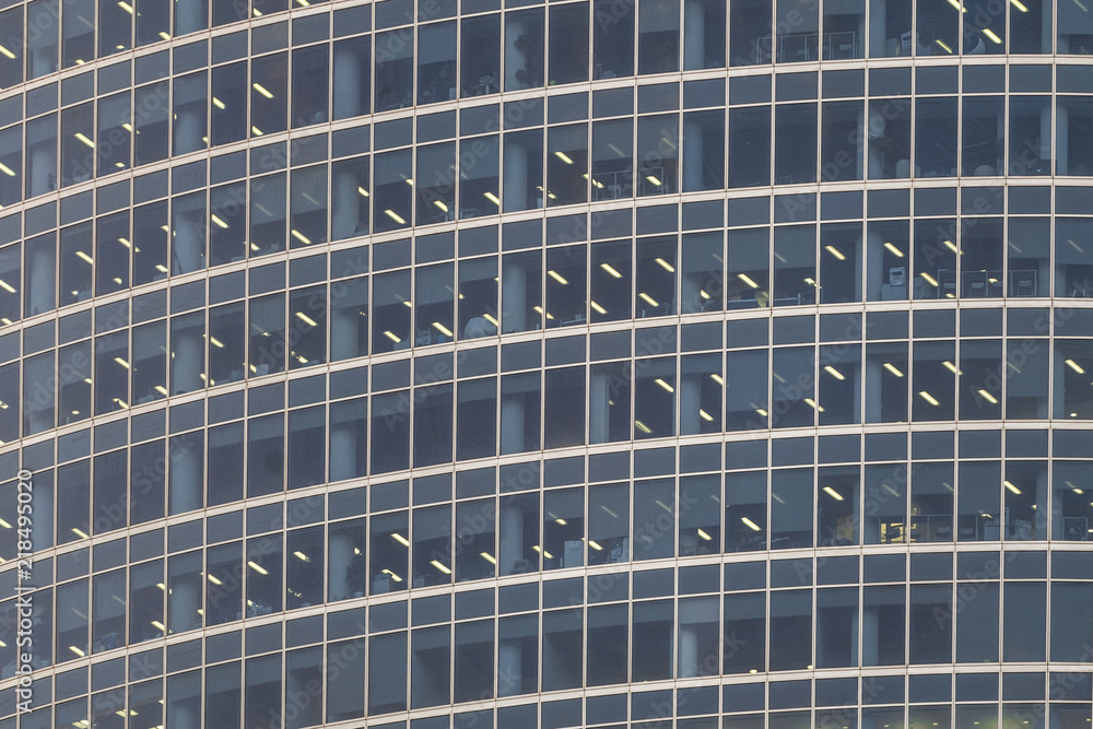 Obraz premium Translucent stained-glass windows of the modern apartment skyscraper building