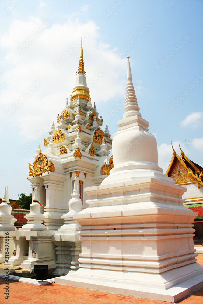 White and Goldden Pagoda at Wat Phra Chaiya temple located in Suratthani Province, Thailand.