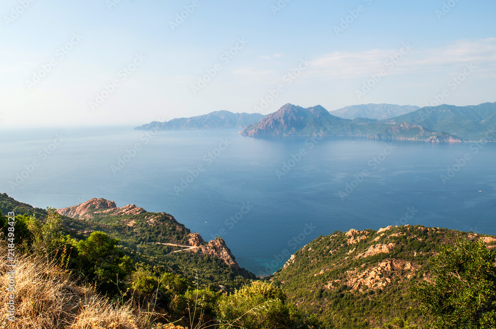 View of the sea and the mountains of the typical landscape on the island of Corsica (region Calanche)