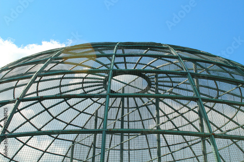 Vászonkép Metal large aviary for birds in the form of a dome