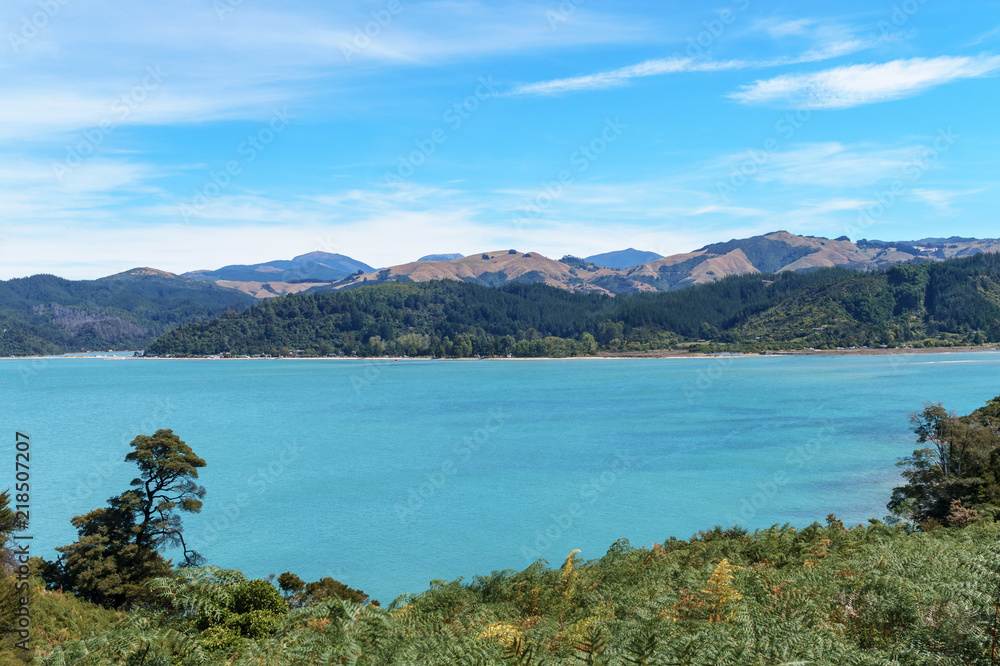 View over turquoise sea and distant hills View over turquoise sea and distant hills