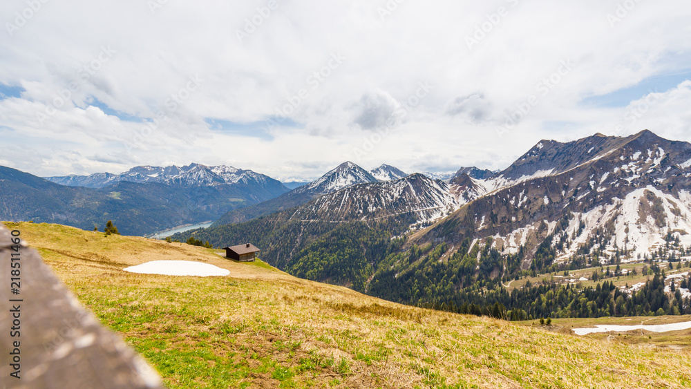 Valley of Achenkirch, with alp and lake Achensee and snow covered mountains, Austria,