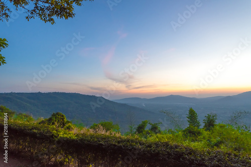 Scenic view of sunrise mountains at northeast Thailand, Mountain range for climbing in mountain trails. the landscape of mountain which including of copy-space for texting.