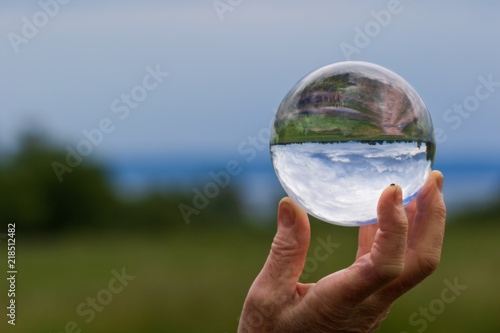 holding the earth in one hand