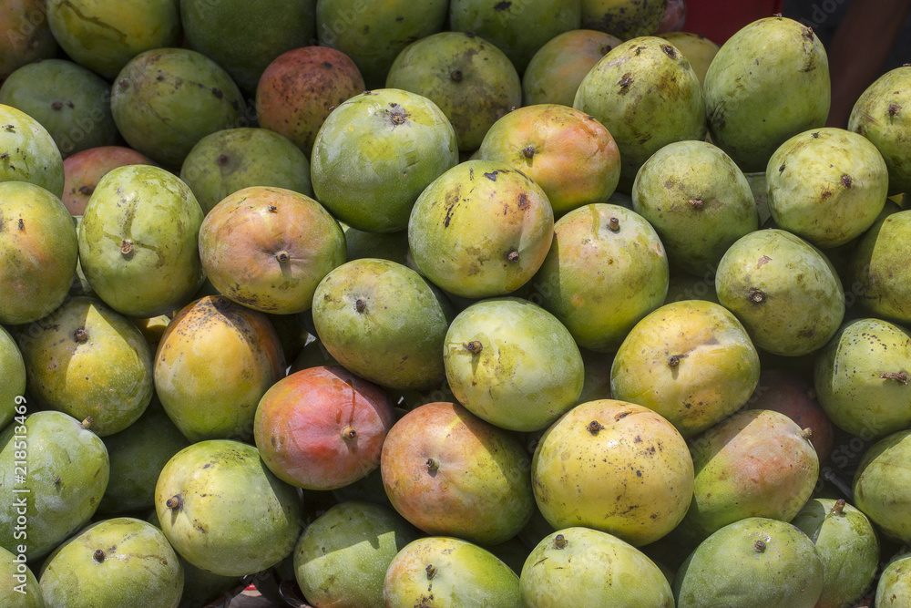Ripe mango fruit on the local market in Island Bali, Ubud, Indonesia, closeup Ripe mango fruit on the local market in Island Bali, Ubud, Indonesia, closeup