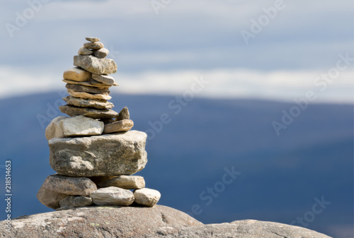 Pile of rocks and pebbles on top of mountain