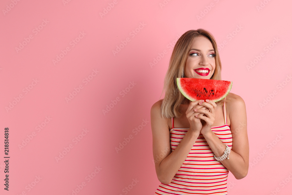 Pretty young woman with juicy watermelon on color background Pretty young woman with juicy watermelon on color background