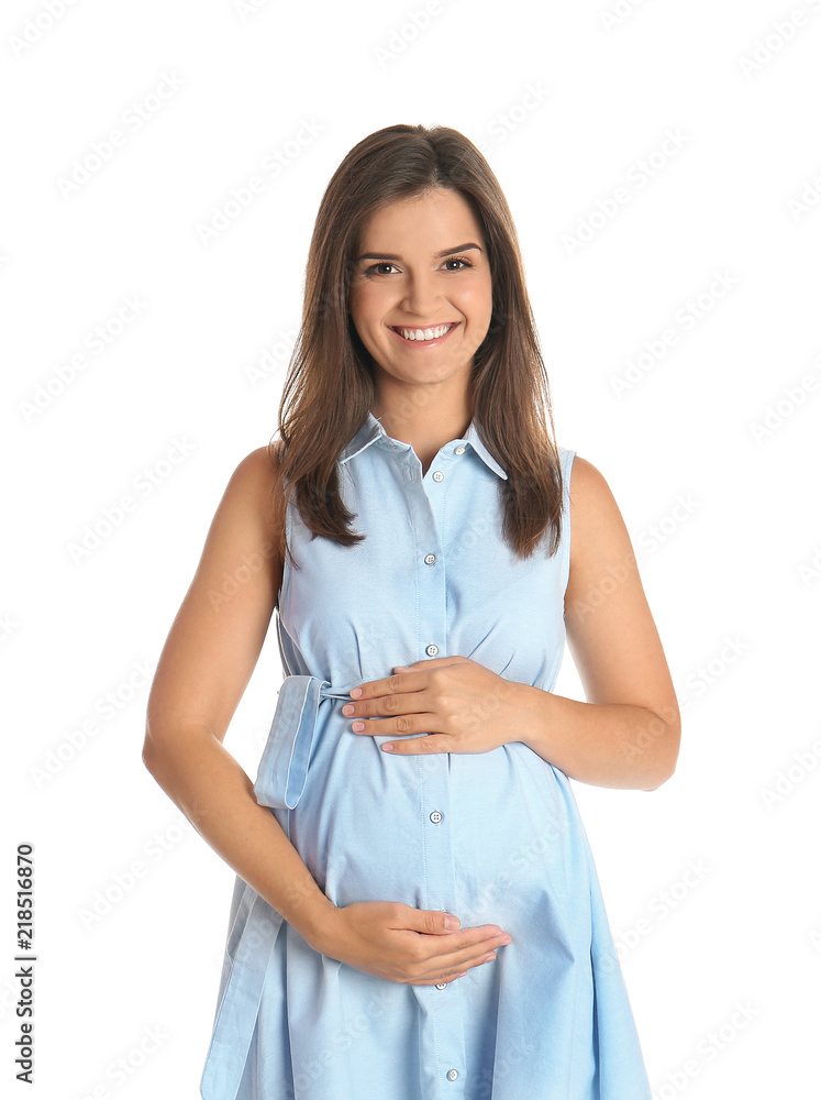 Happy pregnant woman touching her belly on white background Happy pregnant woman touching her belly on white background
