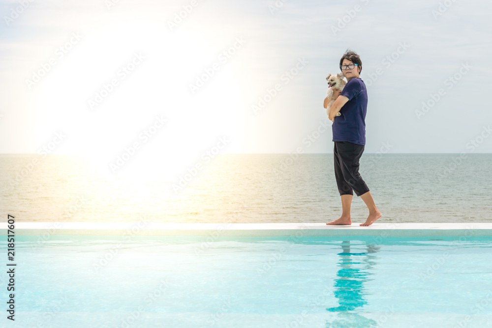Woman and dog at outdoor swimming seaside the sea Woman and dog at outdoor swimming seaside the sea