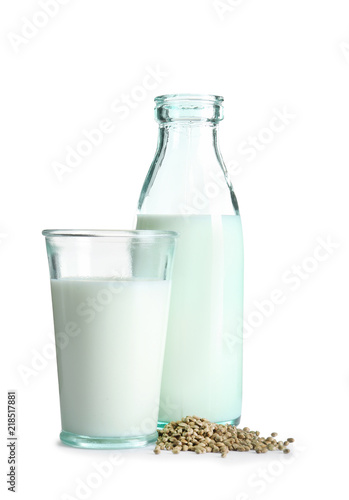 Glassware with hemp milk on white background