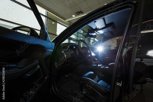 interior of a modern car with steering wheel © Angelov