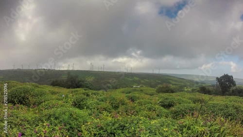 Timelapse at a Windmill Farm. This timelapse is shot in monsoon at Chalkewadi, Satara, India. photo