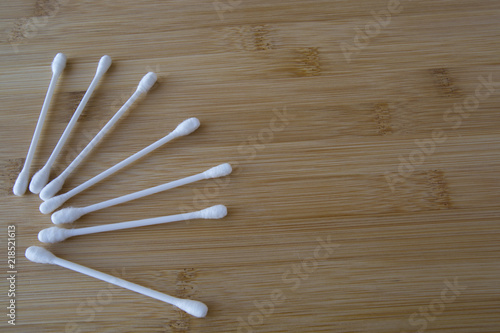 Cotton bud wood stick or cotton swab on background