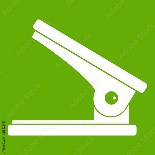Office paper hole puncher icon white isolated on green background. Vector illustration