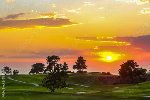 sunset over golf course