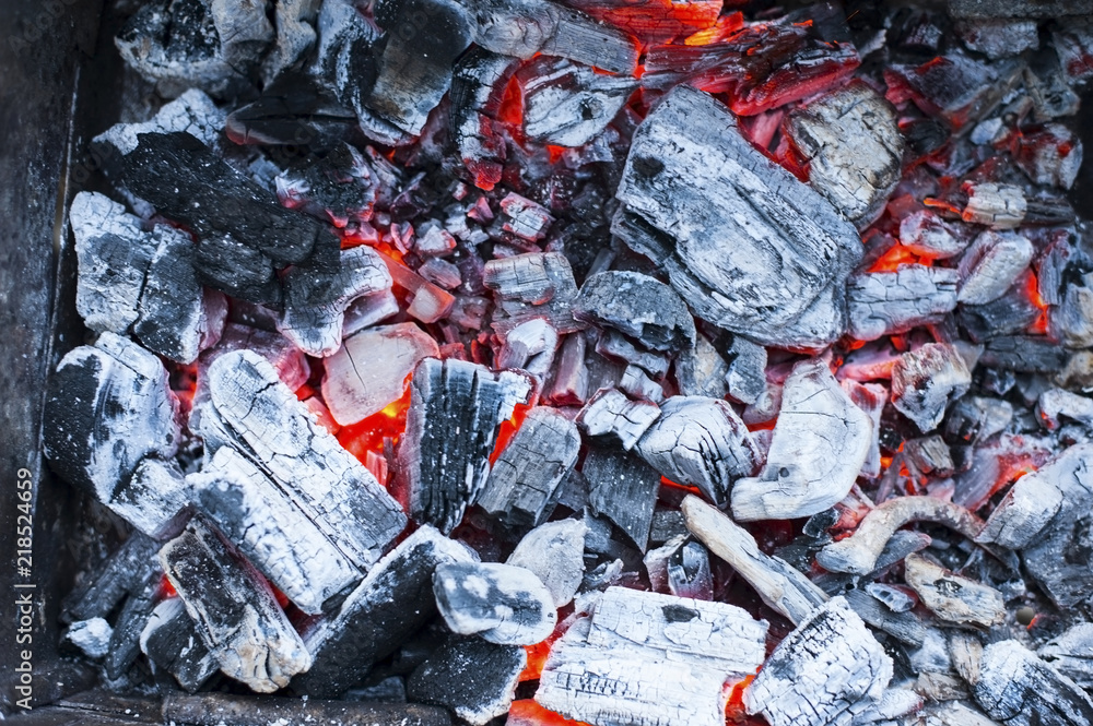 Charcoal from burnt wood - coal for baking meat, potatoes, barbecue vegetables while on vacation on the nature Charcoal from burnt wood - coal for baking meat, potatoes, barbecue vegetables while on vacation on the nature