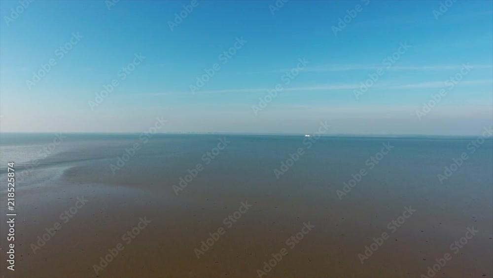 AERIAL: Hike to Halling Oland in the Wadden Sea on a sunny day AERIAL: Hike to Halling Oland in the Wadden Sea on a sunny day