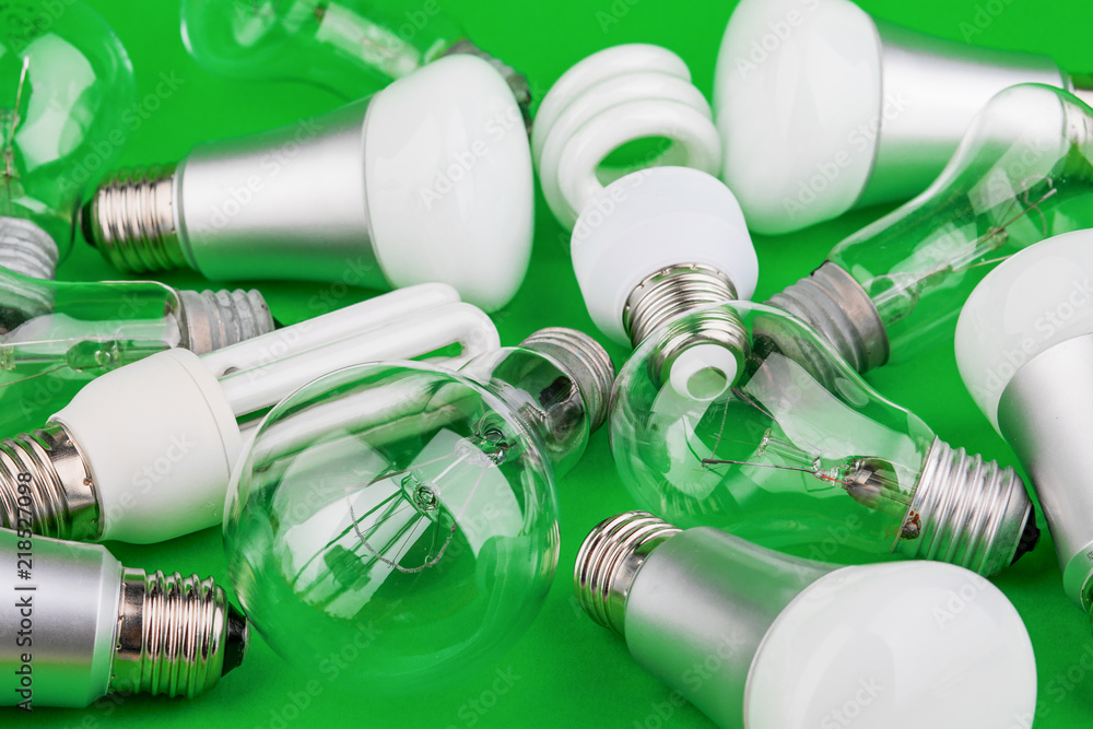 large number of bulbs on a green background large number of bulbs on a green background
