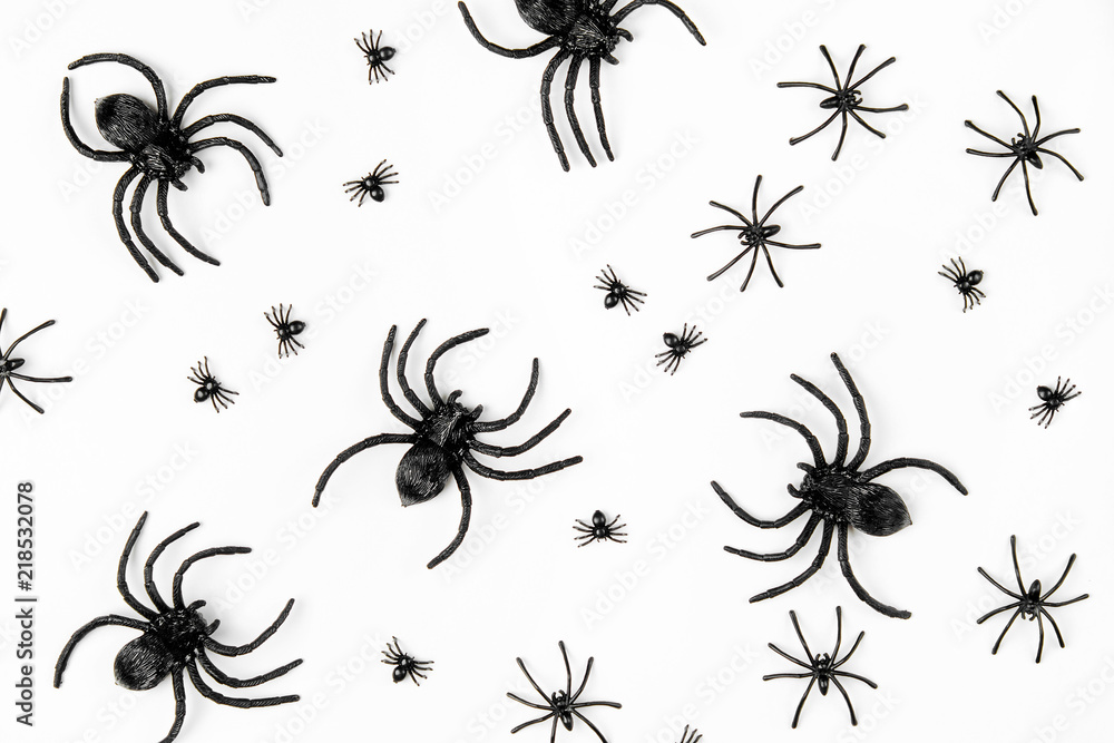 Halloween background with  spiders. Flat lay, top view trendy holiday concept..