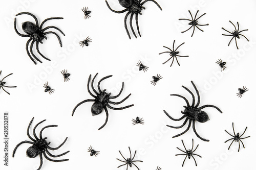 Halloween background with spiders. Flat lay, top view trendy holiday concept..