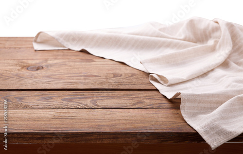 Tablecloth on wooden table isolated. Canvas, dish towels on kitchen top view mock up. Selective focus.