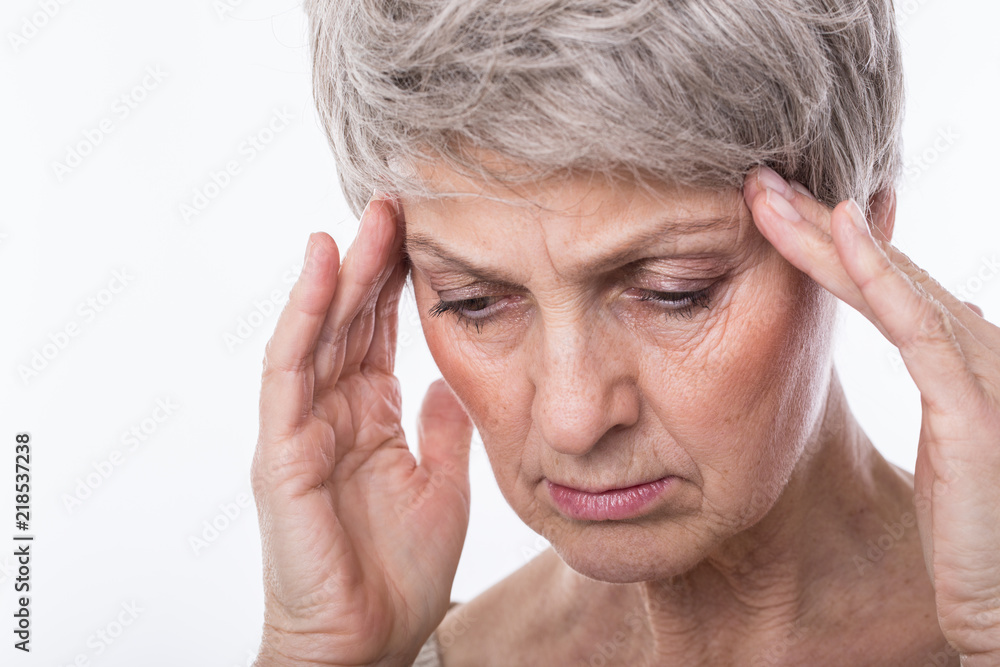 Seniorin woman with gray hair headache pain Seniorin woman with gray hair headache pain
