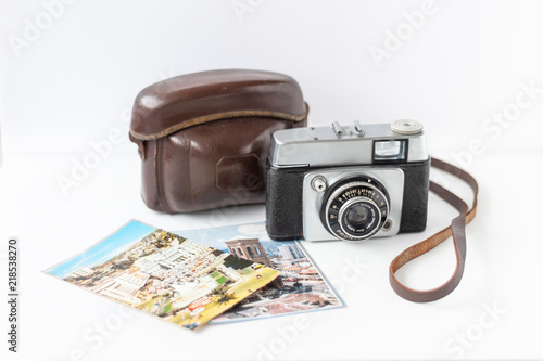 Vintage camera with photographs