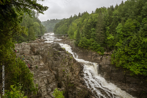 QUEBEC CITY, QUEBEC / CANADA - JULY 14 2018: Canyon Ste-Anne at rainy day