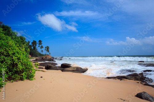 Tropical beach with stones in Sri Lanka