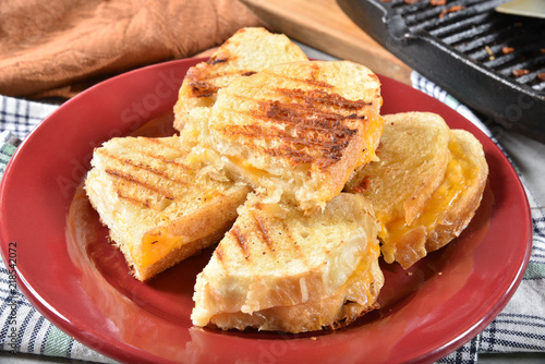 Sliced grilled cheese sandwiches
