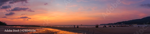 panorma - beautiful orange purple sunrise at beach shore of thailand © manushot