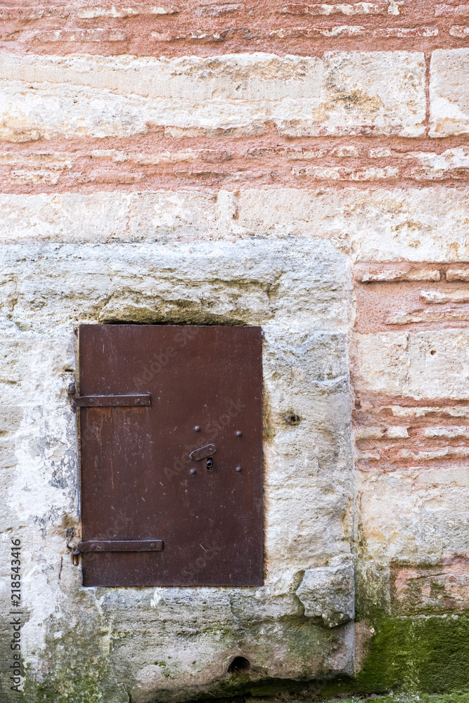 Stone Wall – Background Rustic Stone  Wall in a Old Construction.