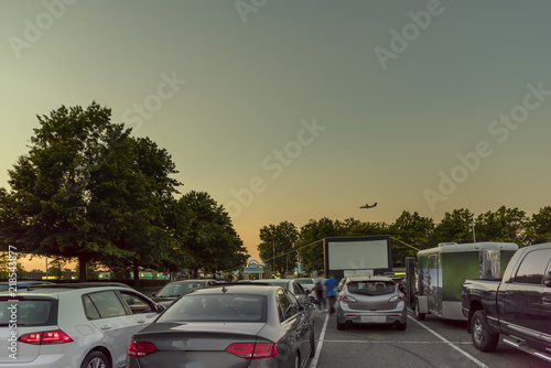 city parking with an inflatable screen of a summer cinema, waiting for a movie © Viktor Birkus