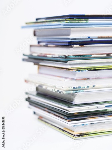 Stack of children's books on a white background.