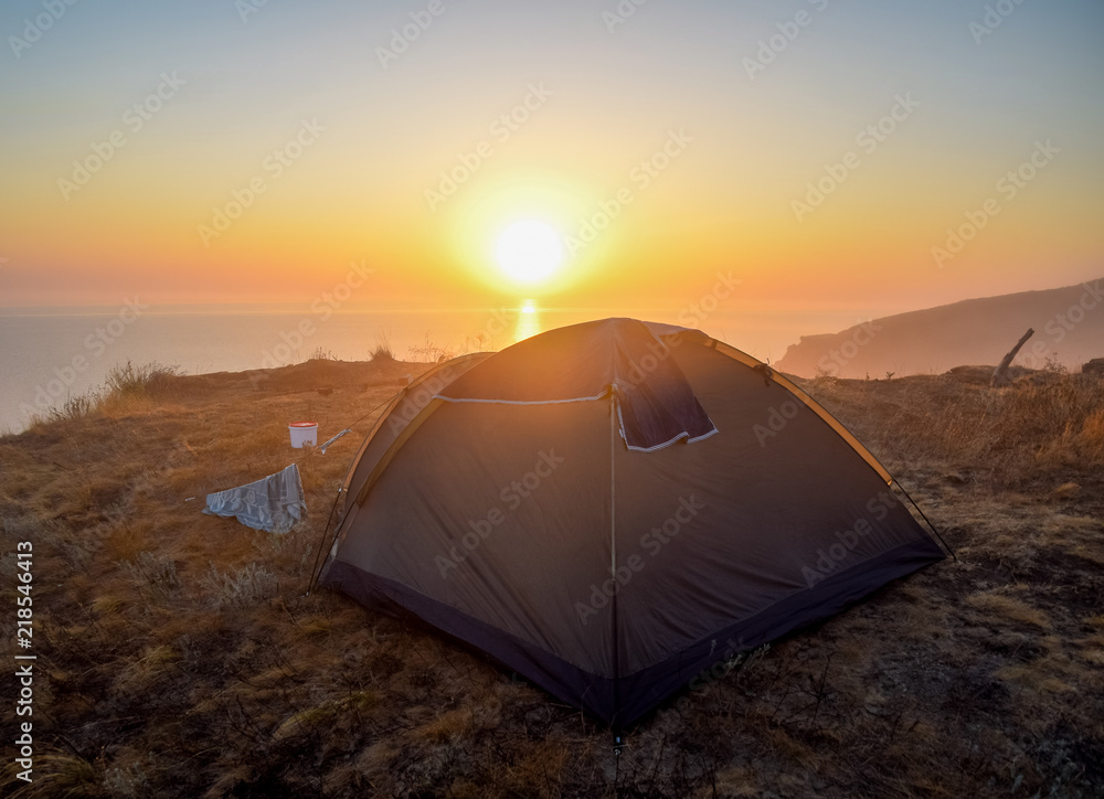 Dawn over the sea, Sunrise over the tent.