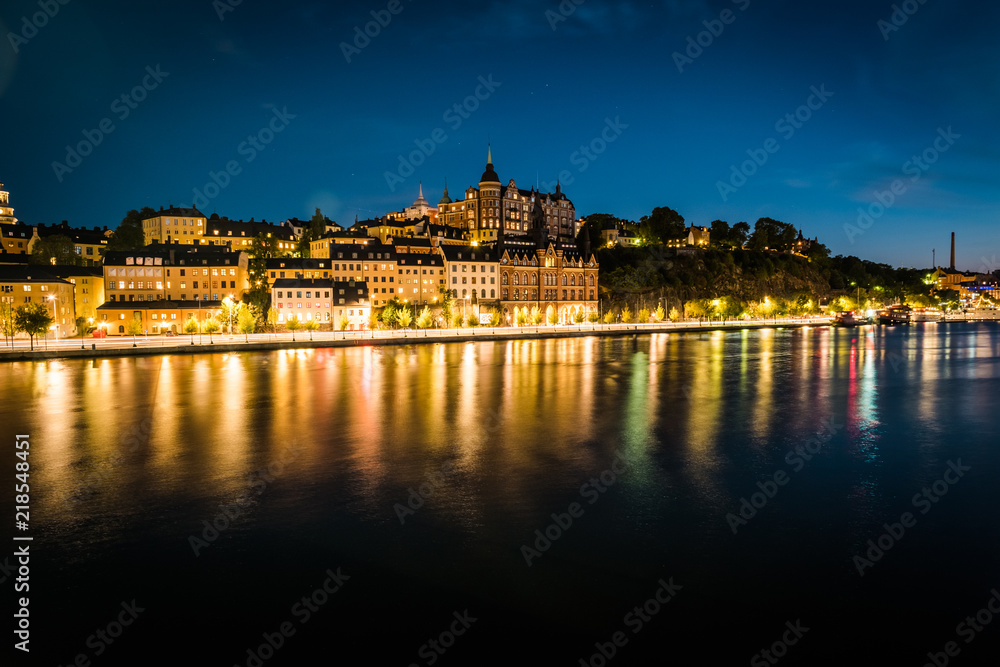 Panoramic view of Old Town in Sweden - Stockholm (Gamla Stan) in a summer night. Reflection