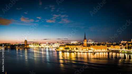 Panoramic view of Old Town in Sweden - Stockholm (Gamla Stan) in a summer night. Reflection