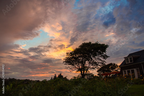 Vivid sunset over Fishers Island in Long Island Sound in August photo