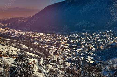 Brasov, Transylvania. Romania. Panoramic view of the old town and Tampa mountain photo