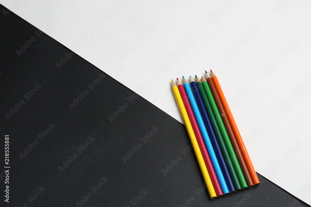 Fototapeta premium color pencils on black and whit back ground