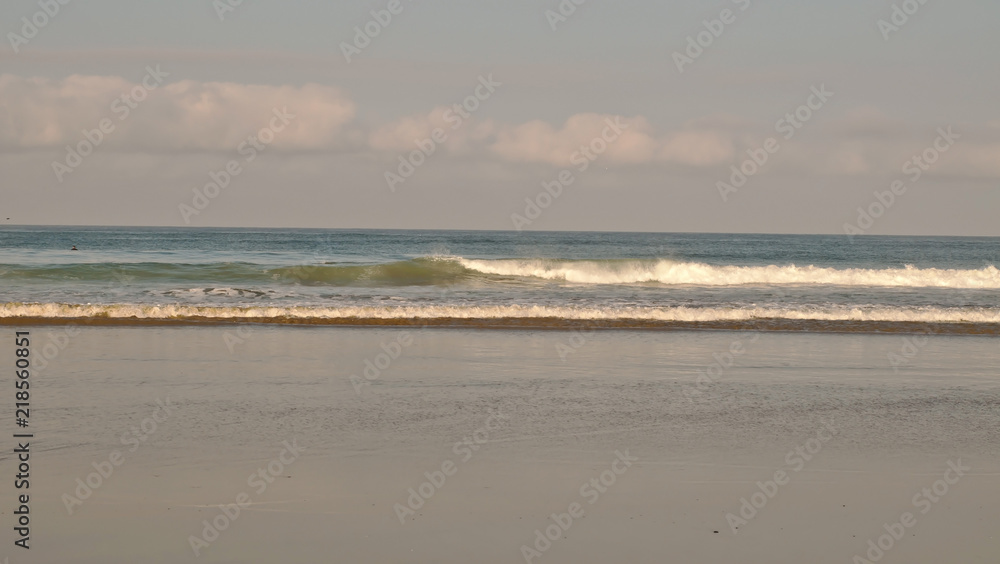 Waves crashing onto the beach from the Pacific ocean in southern California, USA Waves crashing onto the beach from the Pacific ocean in southern California, USA