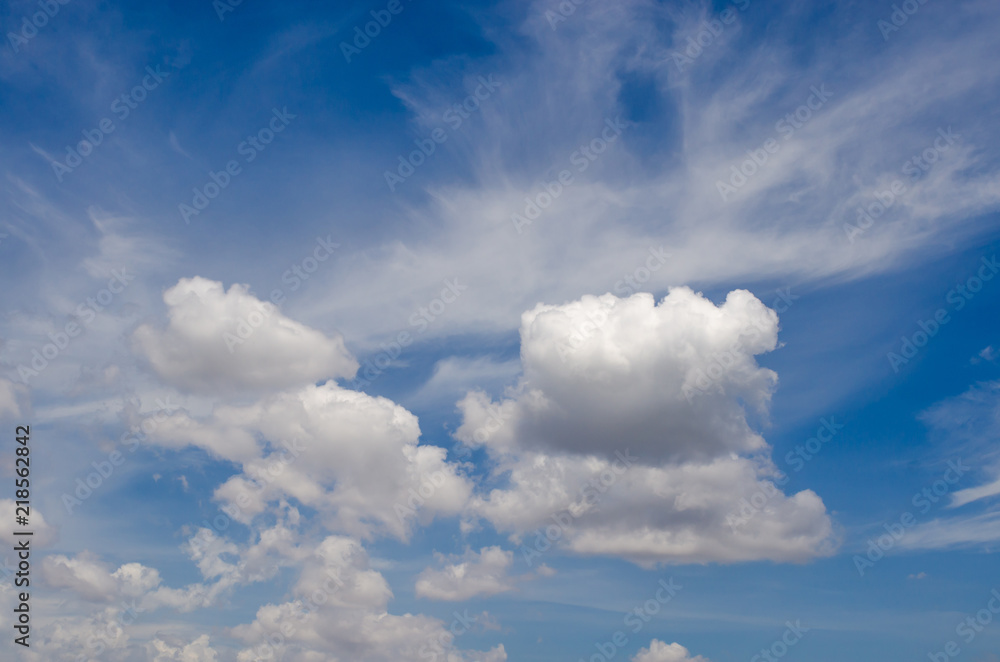 Obraz premium Blue sky with white clouds different shapes them.