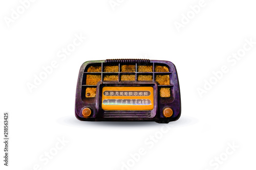 The old retro radio on white background. This is the vintage radio for listen to music and songs. Photo for old style and Media Concept