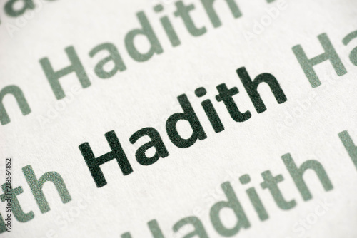 word Haddith printed on paper macro photo