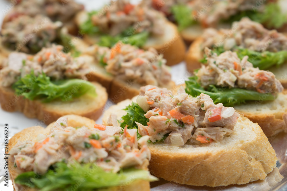 close up tuna salad on baguette