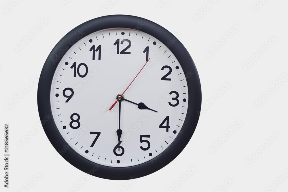 Time concept with black clock at half past three Time concept with black clock at half past three