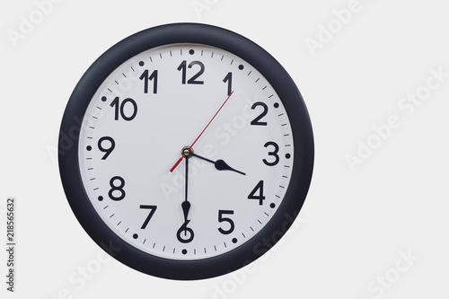 Time concept with black clock at half past three