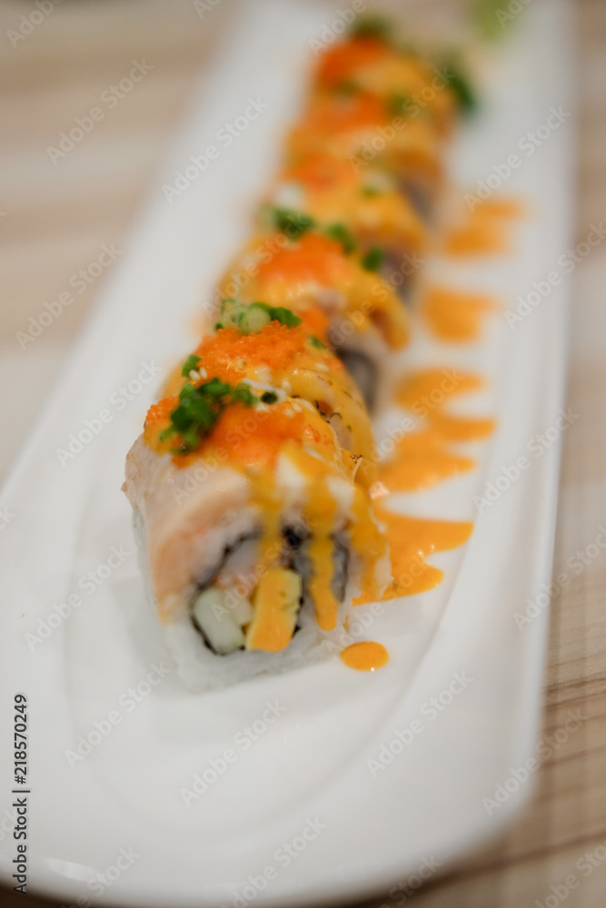 Spicy sushi salmon roll, Japanese cuisine Spicy sushi salmon roll, Japanese cuisine